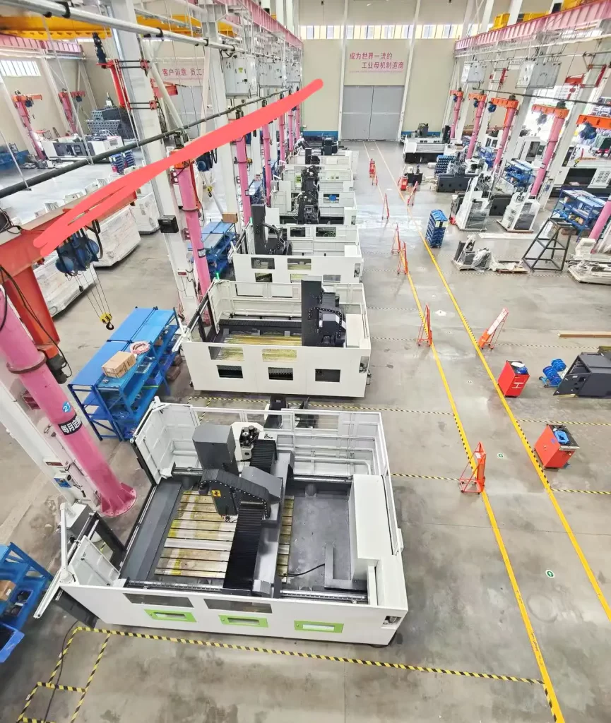 Aerial view of large-scale CNC machining plant with automated machines – showcasing high productivity, efficiency, and scalable production for precision manufacturing.
