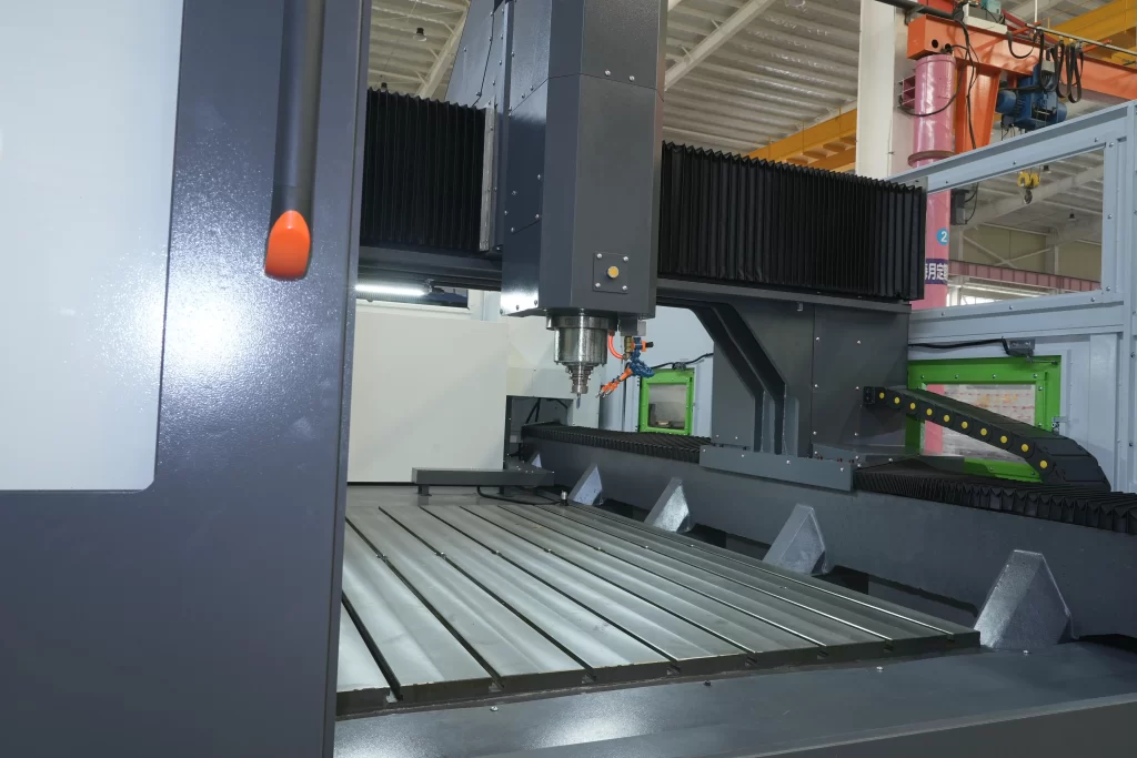 Close - up of the spindle assembly on CNC Gantry Machining Center MD, including coolant lines, tool holder, and structural details.