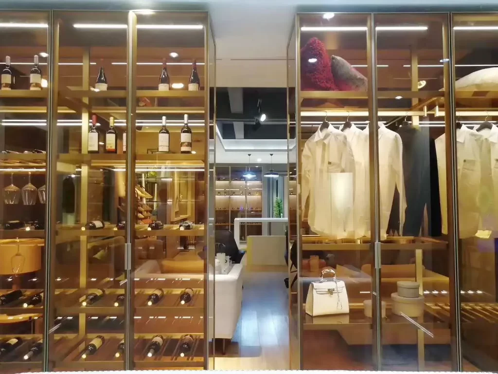 Elegant glass showcase with CNC - machined metal frames, displaying luxury items—demonstrating the aesthetic applications of metal CNC machining in interior design.